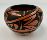 Black over Red Pottery by Caroline G. Loretto